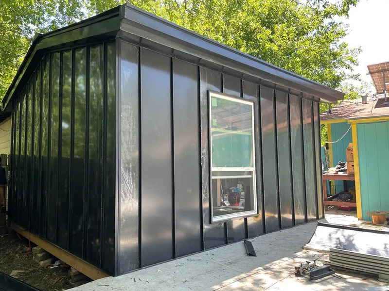 Black standing seam metal wall panels for Roof Inspection in Hartsville